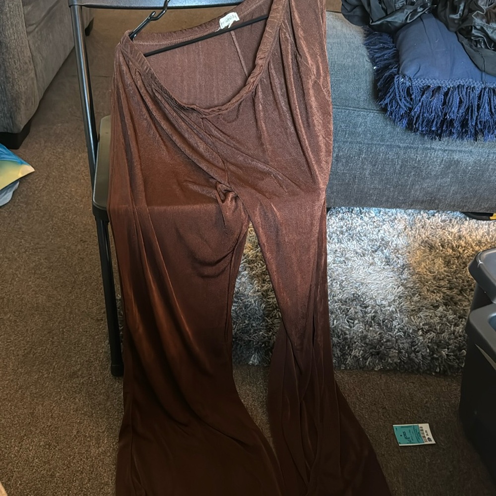Brown polyester/ spandex long flared pants with lots of stretch.